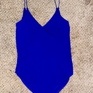 Blue body suit